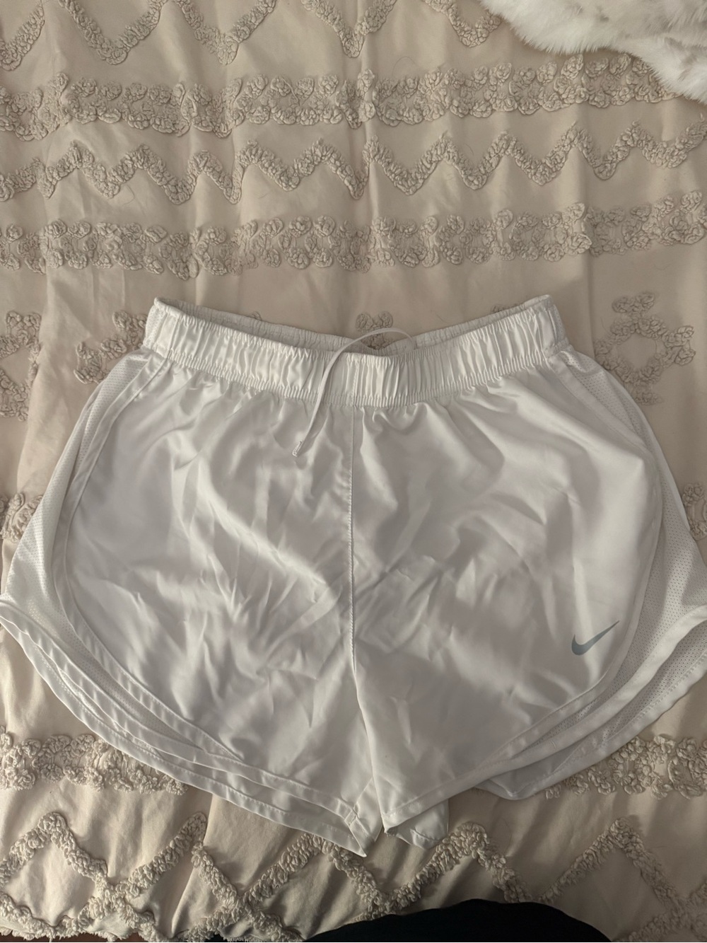 Nike Women's White Athletic Running Shorts with Subtle Swoosh